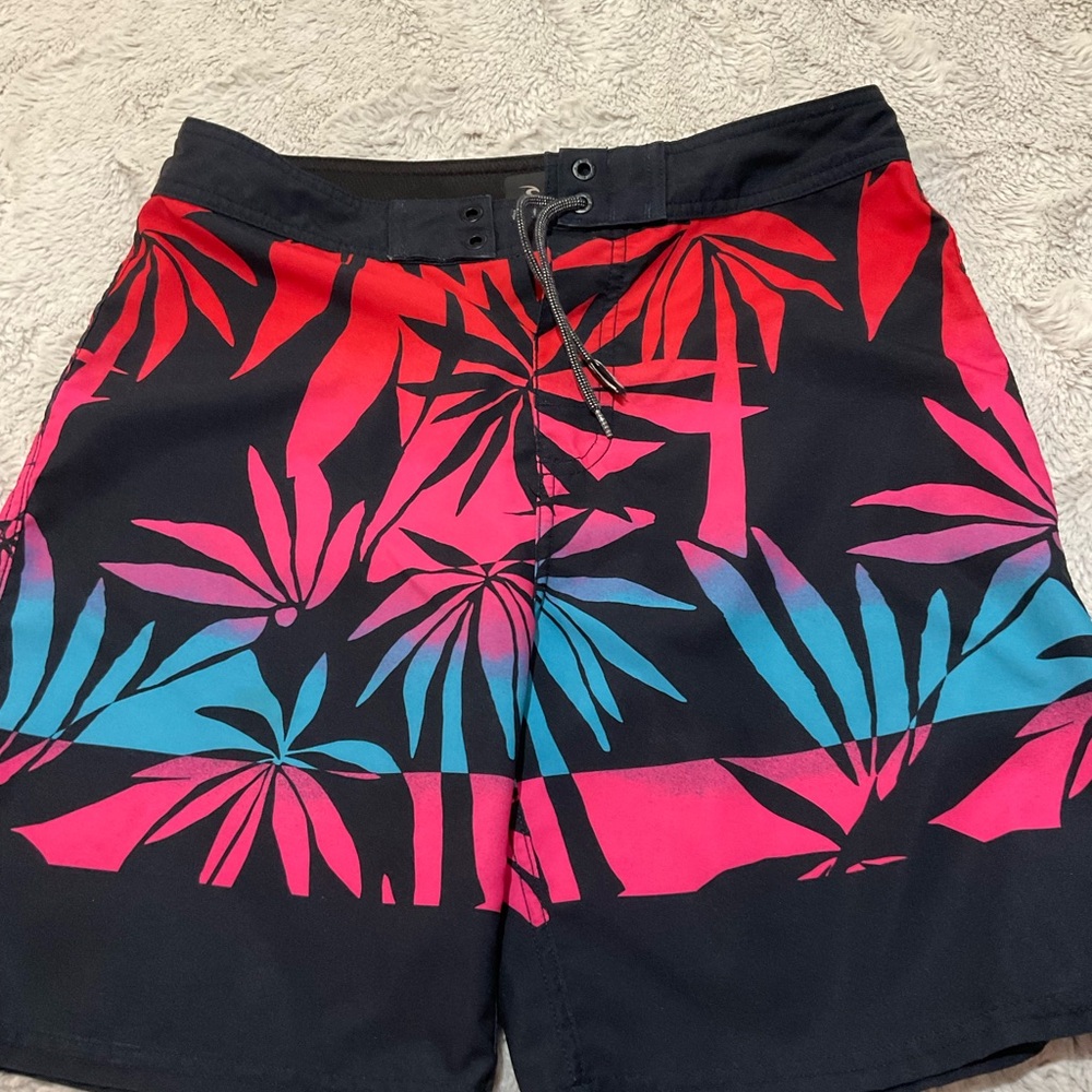 Rip Curl Red and Blue Board Shorts with Bold Tropical Design